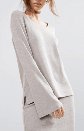 Neutral colored, long sleeved, flared tunic