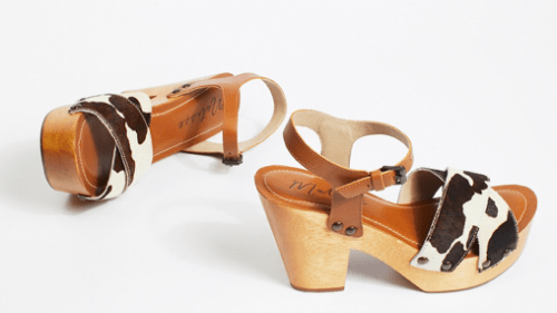 Clogs with cow print strap