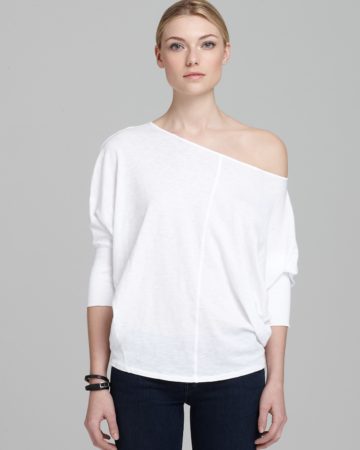 White dolman sleeve top with asymmetric neckline