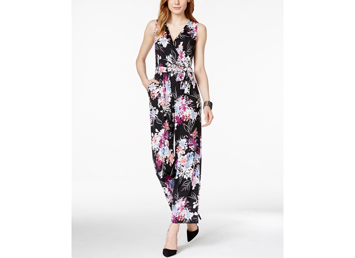 petite model wearing floral jumpsuit