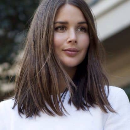 Brunette woman with long, blunt cut 