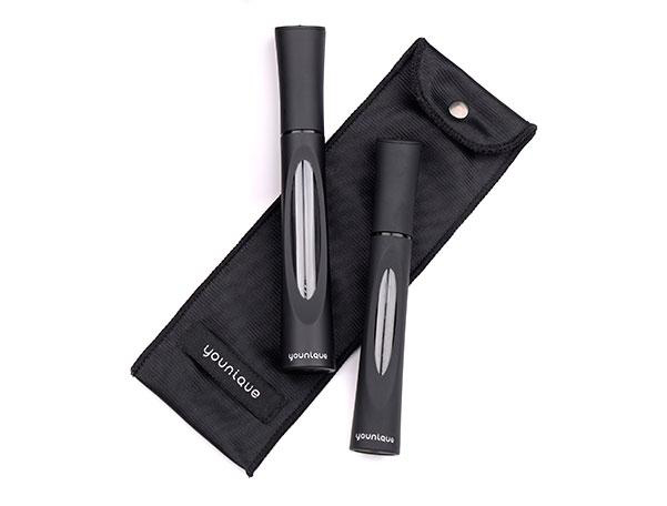 black containers of fiber mascara