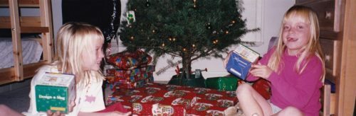 My girls opening presents the year we decided to put the tree in their room. 