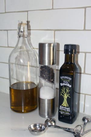 Holy Smoke olive oil, regular olive oil and salt and pepper shaker