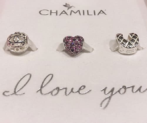 Set of three charms that spell out I love you