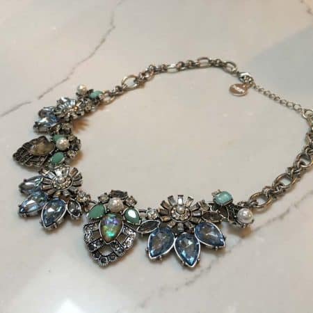 Close-up of floral bib necklace from Three Sisters