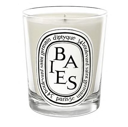 White candle in glass container